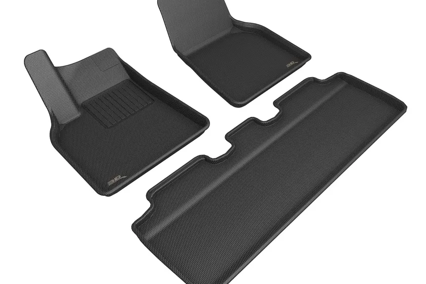 3D MAXpider Kagu custom fit floor mats in black with carbon fiber style textured surface and raised edges