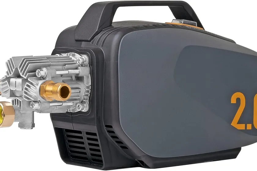 Active 2.0 compact dark grey pressure washer with orange 2.0 badge, exposed aluminum pump head and molded carry handle