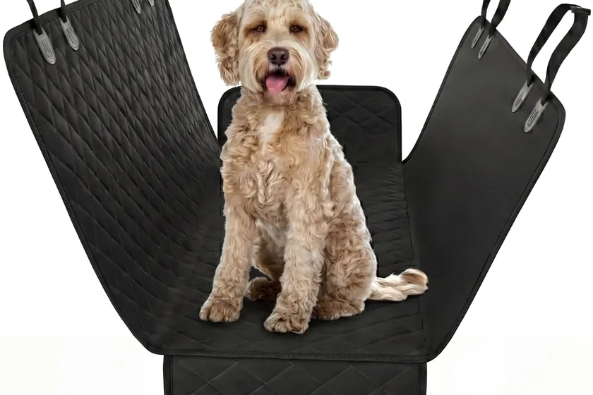 Active Pets black convertible dog hammock seat cover installed across a truck back seat bench