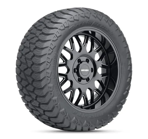 AMP Terrain Attack A/T A light truck tire standing upright, showing its chunky all terrain tread blocks, deep shoulder lugs and black sidewall