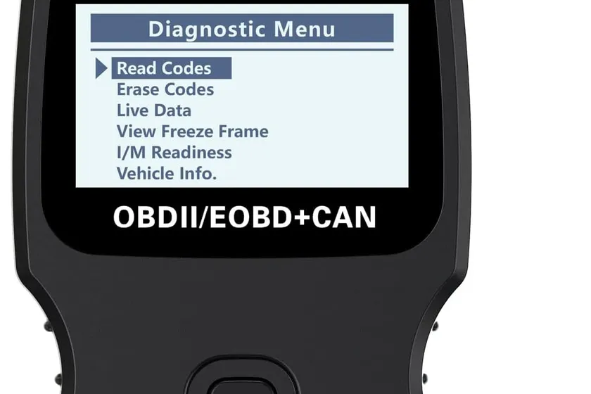 ANCEL AD310 black handheld OBD2 code reader with its 16-pin connector cable