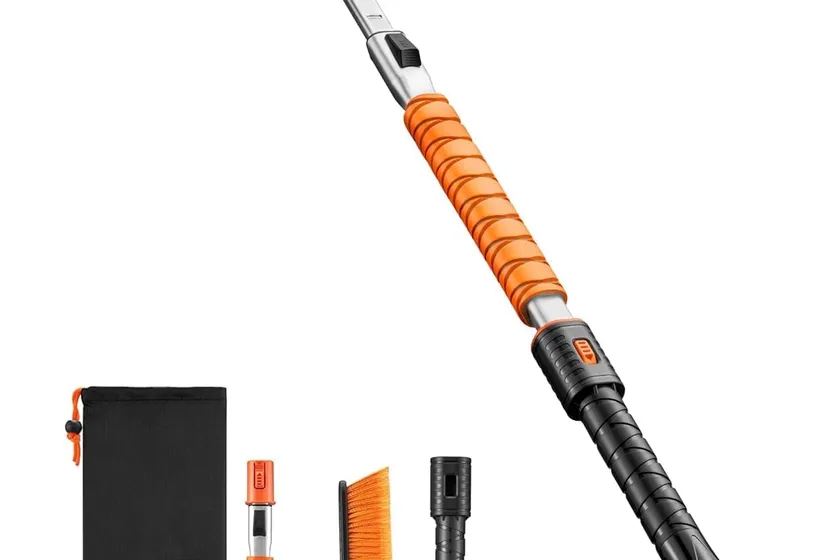 Orange AstroAI extendable snow brush with an aluminum alloy pole, pivoting brush head and a wide ice scraper blade