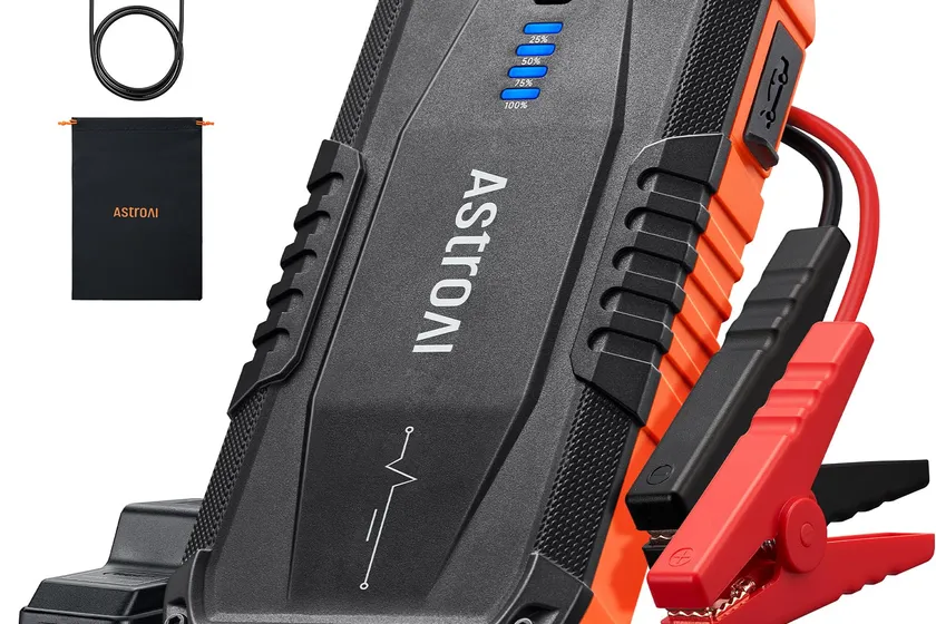 AstroAI S8 orange and black compact lithium jump starter with smart jumper cables and carrying case