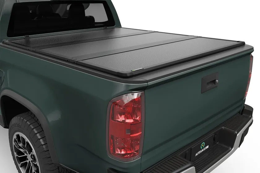 AUTOSAVER88 FRP hard tri-fold tonneau cover closed over the bed of a Chevy Colorado