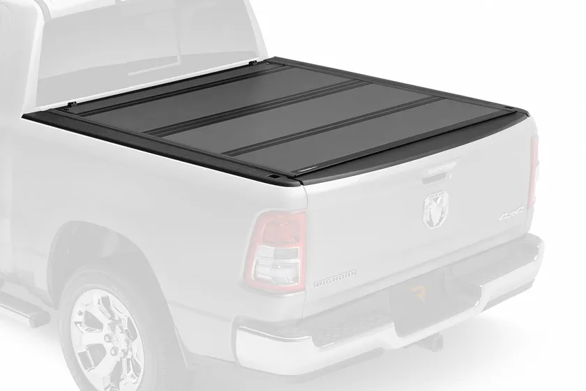 BAKFlip MX4 hard folding tonneau cover with matte black panels installed on a pickup bed