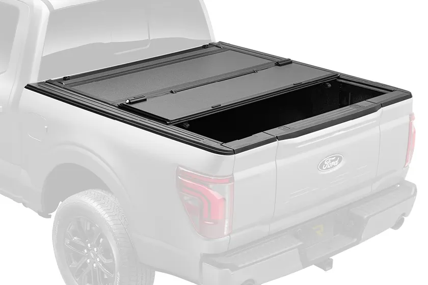 BAK BAKFlip MX4 hard folding tonneau cover with matte black aluminum panels shown on a Honda Ridgeline bed
