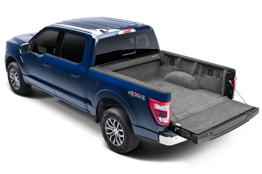 BedRug Classic charcoal grey carpet-style drop-in bed liner installed in a Ford F-150 bed
