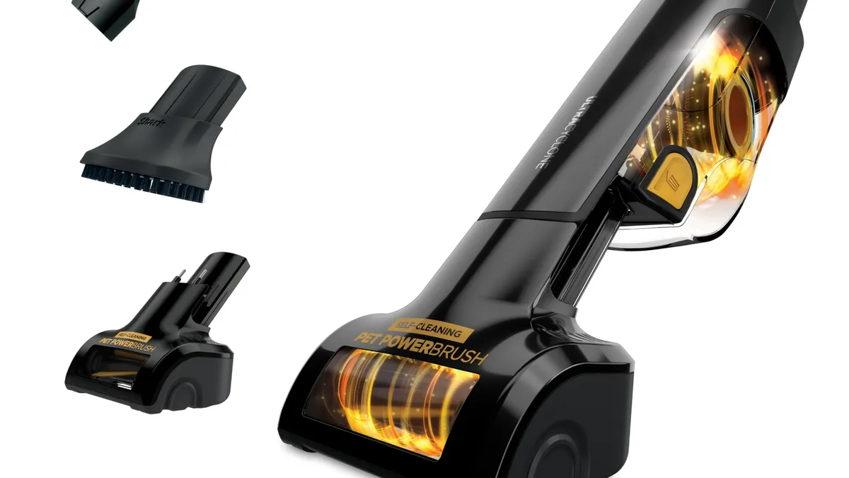 Cordless handheld car vacuum with a motorized pet brush and crevice tool for cleaning a car interior