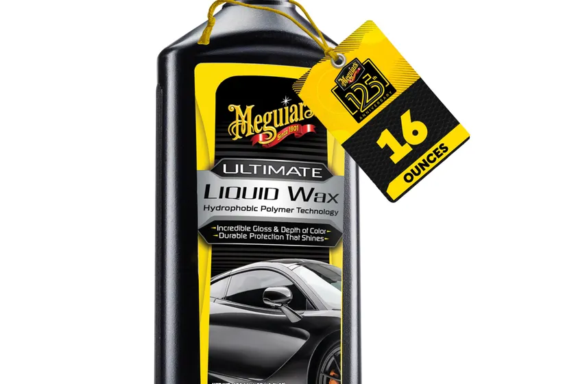 Meguiar's Ultimate Liquid Wax 16 oz bottle with the included microfiber towel and foam applicator pad