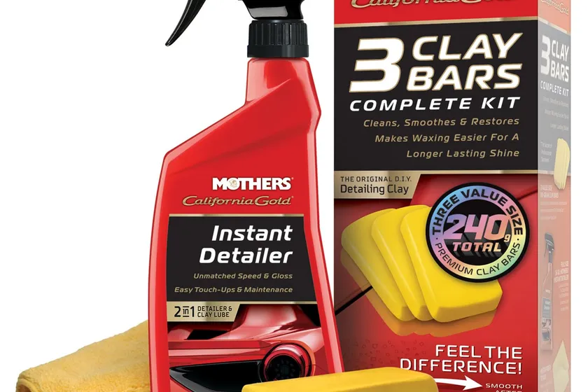 Mothers California Gold clay bar kit box with three gold clay bars, Showtime detailer spray and a microfiber towel