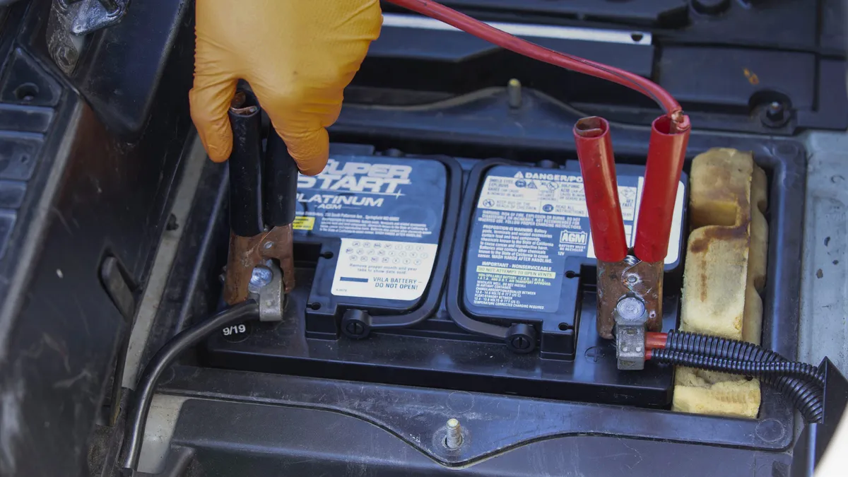 jumper cables shown in a real-world setting for this guide
