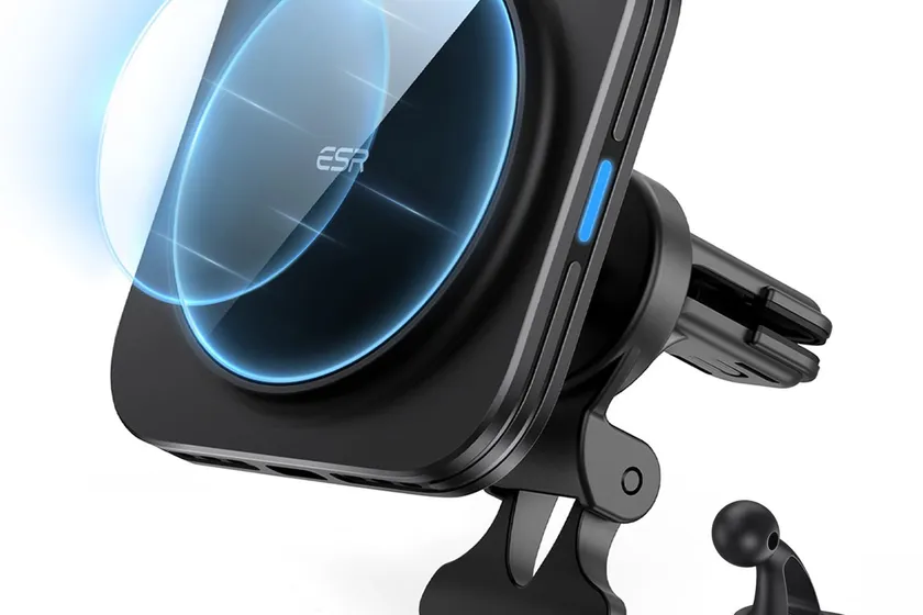 ESR HaloLock black magnetic wireless car charger holding an iPhone on an air vent