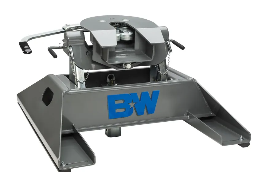 B&W Companion RVK3500 fifth wheel hitch with a cast head and cam-action latching arm mounted on a pickup truck bed