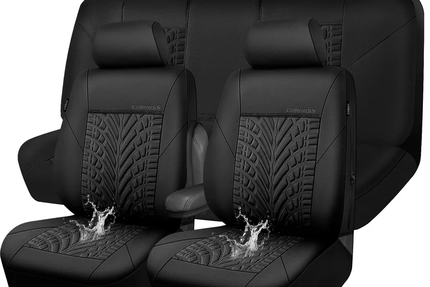 Black CAR PASS neoprene waterproof full set seat covers with 3D tire embossing installed across a five seat cabin