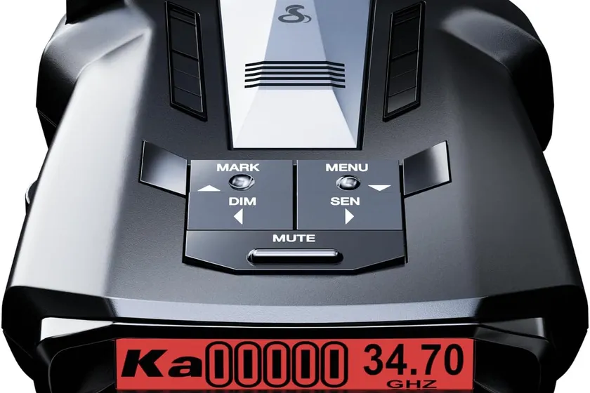 Cobra RAD 700i radar detector with its five-color OLED display on a car windshield