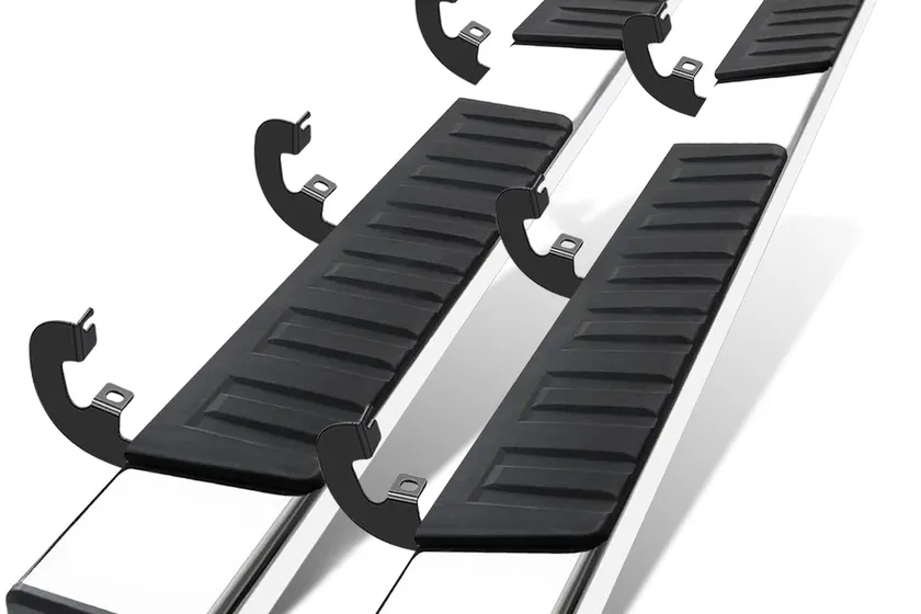 COMNOVA 6 inch stainless steel running boards with full length tread mounted on a Chevy Silverado 1500 crew cab