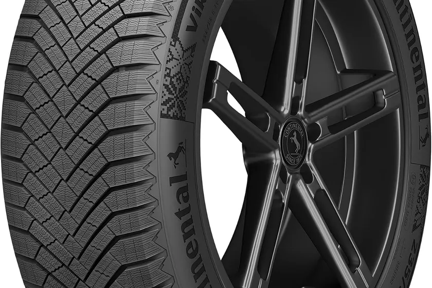 Continental VikingContact 8 winter tire standing upright, showing its dense three-dimensional siping and black sidewall