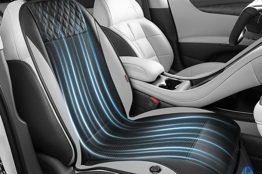 Gray Coverado ventilated cooling car seat cushion with built-in fans shown on a driver seat
