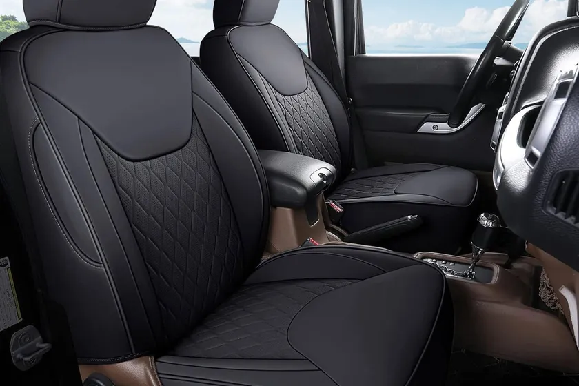 Black Coverado custom fit leather front seat covers installed on Jeep Wrangler bucket seats