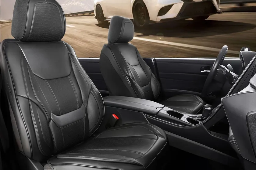 Black Coverland custom fit waterproof seat covers installed on the front seats of a sedan
