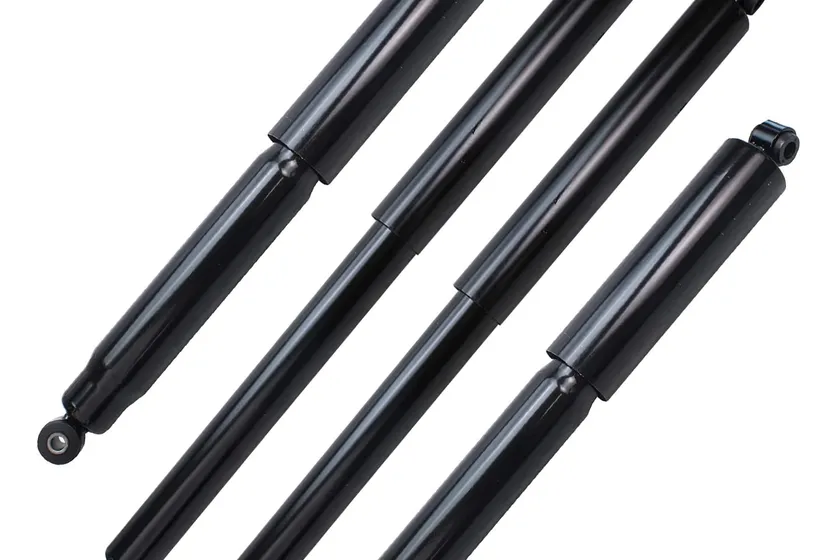 Detroit Axle set of four black replacement shock absorbers for a Ford Super Duty pickup