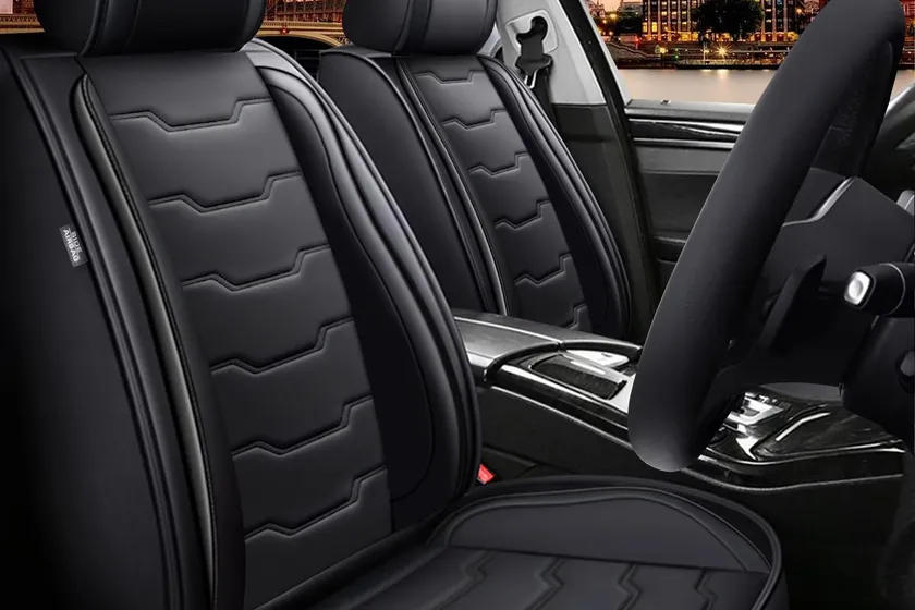 DISUTOGO black waterproof leather seat covers installed on the front and rear seats of a Subaru Crosstrek