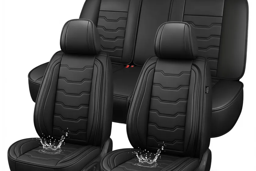 Black DISUTOGO waterproof premium leather seat covers installed across a five seat Subaru Forester interior