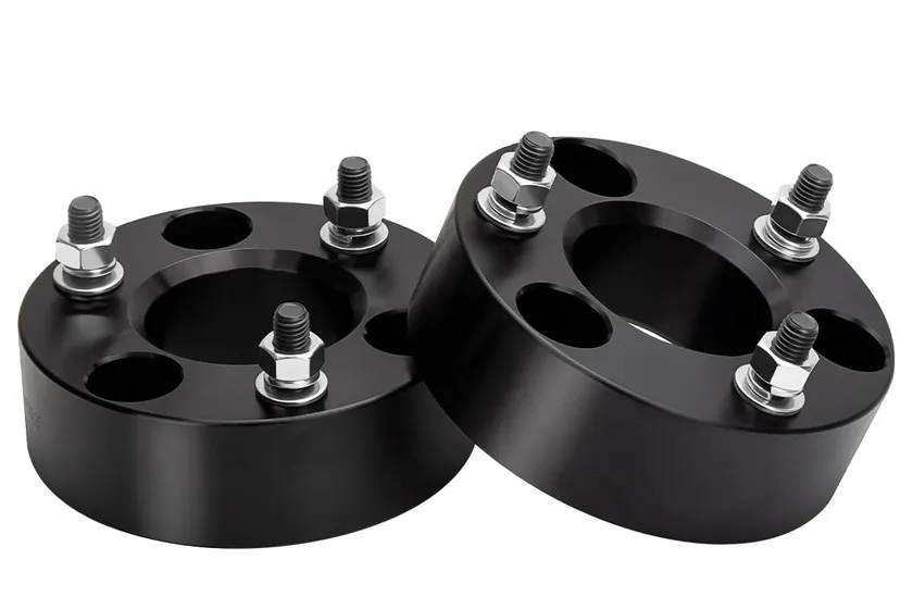 Dynofit 2 inch aluminum front strut spacer leveling kit for a 4WD Ram 1500