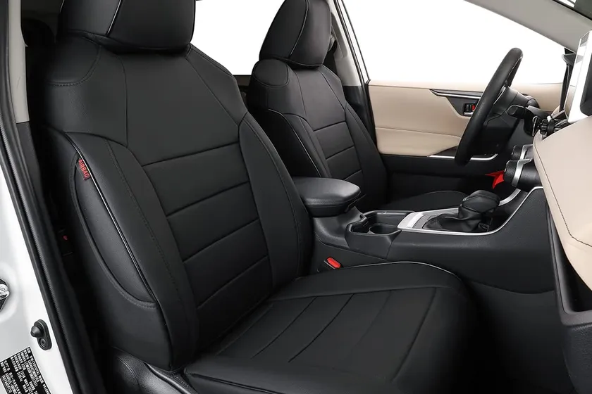 Black EKR custom fit faux leather seat covers installed on the front and rear seats of a Toyota RAV4