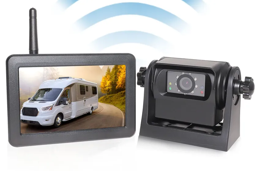 EWAY magnetic wireless hitch camera stuck to a tailgate with a phone showing the live hitch view