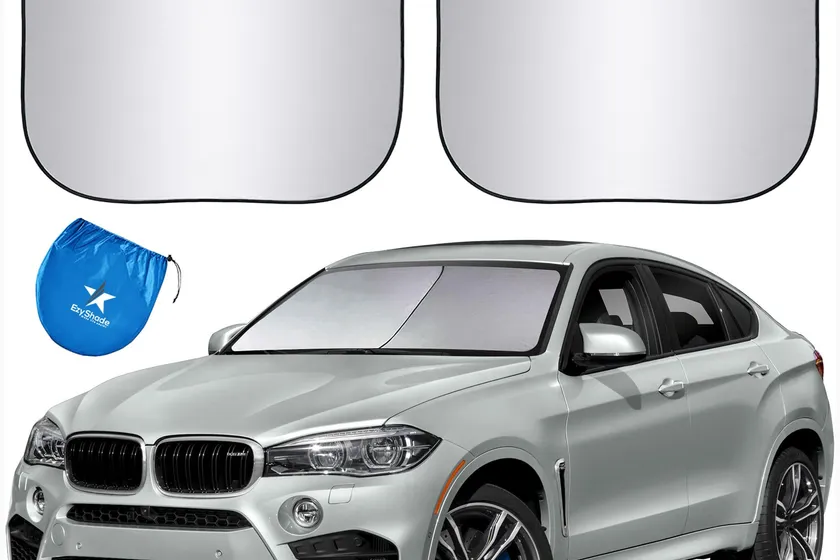 EzyShade two-piece foldable windshield sun shade with reflective silver panels overlapping across a windshield