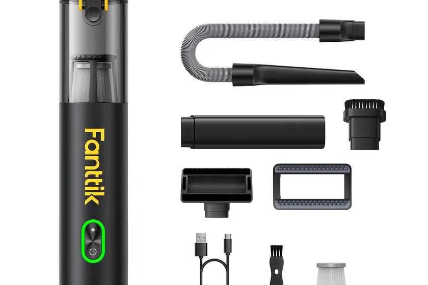 Fanttik V8 Mate compact cordless car vacuum shown with its crevice nozzle and brush head