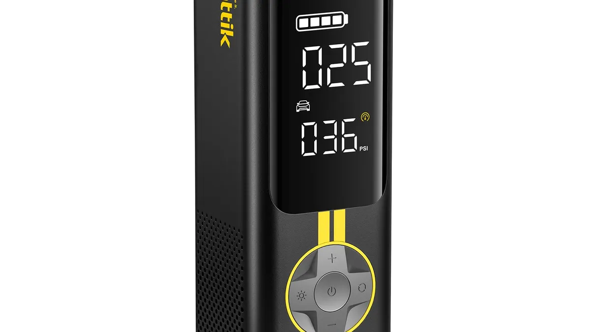 Fanttik X8 APEX cordless portable air compressor used to inflate a car tire
