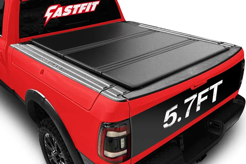 FASTFIT hard tri-fold tonneau cover folded on a Ram 1500 RamBox bed