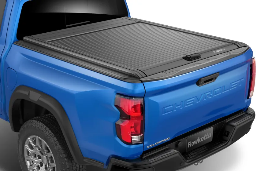 Flowkottu retractable aluminum tonneau cover partly open on a 2023-2026 Chevy Colorado bed