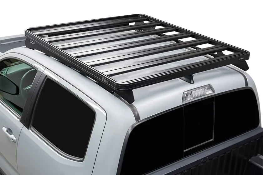 Front Runner Slimline II black aluminum slatted roof rack tray with mounting feet for a Toyota Tacoma