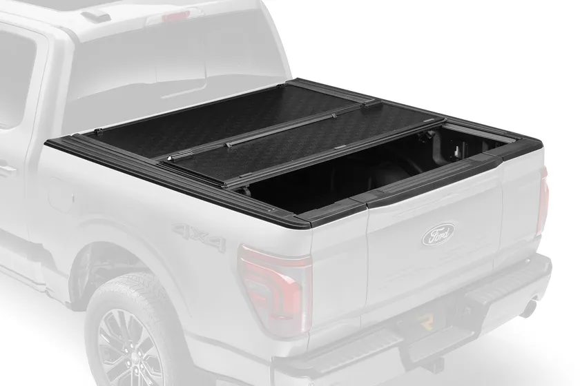 Gator EFX hard tri-fold aluminum tonneau cover partly folded on a Ford F-150 bed