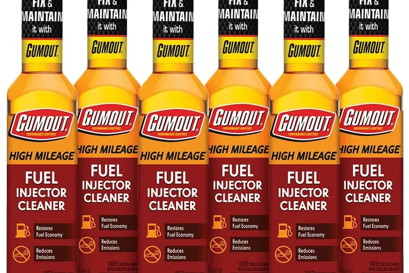 Six Gumout Fuel System Cleaner bottles in their orange and black six pack packaging