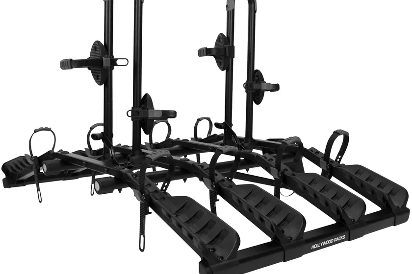Hollywood Racks Destination 4 black platform hitch rack with four individual wheel trays and a center mast