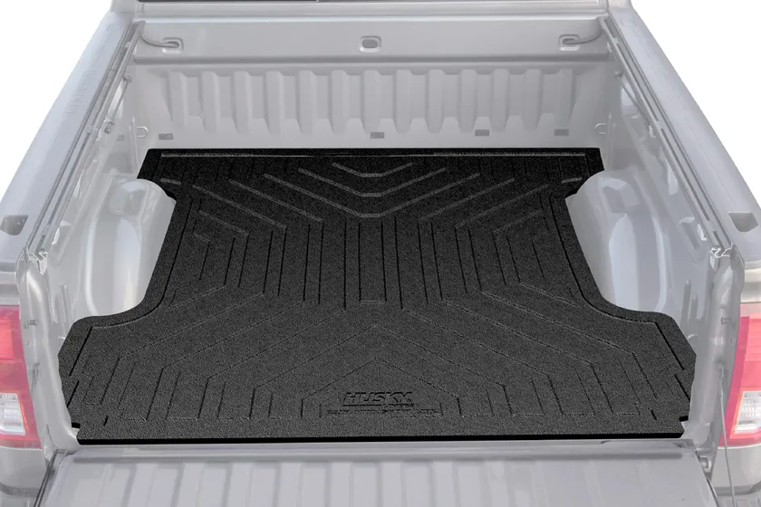 Husky Liners one-piece black custom-molded drop-in bed liner for a Ford F-150 5'7" bed