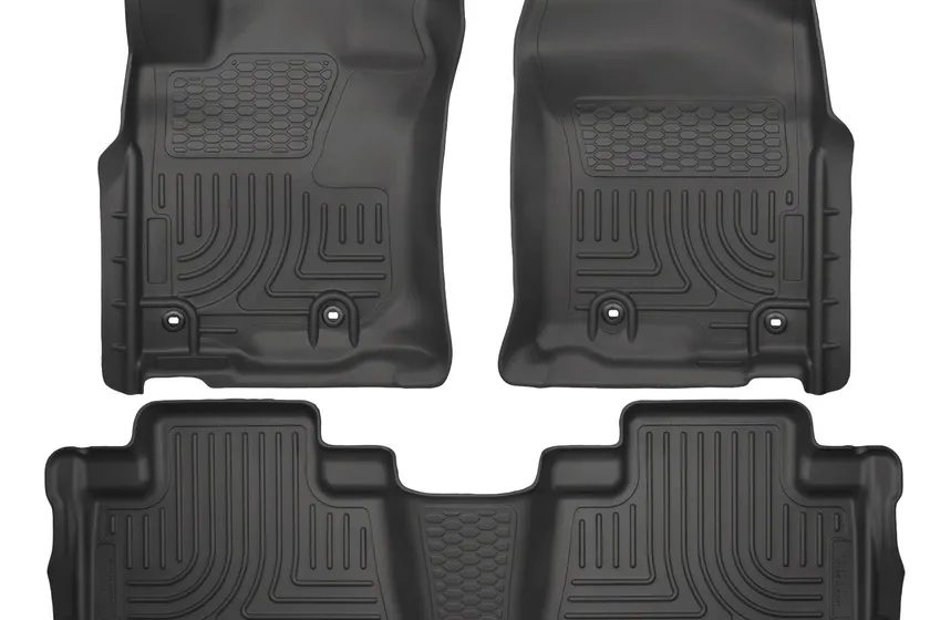 Husky Liners Weatherbeater three piece black floor mat set molded for an SUV front and second row
