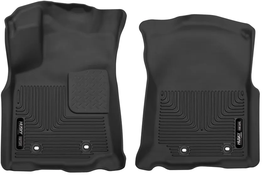 Husky Liners X-act Contour floor mats in black with FormFit raised edges and rubberized surface for a Toyota Tacoma