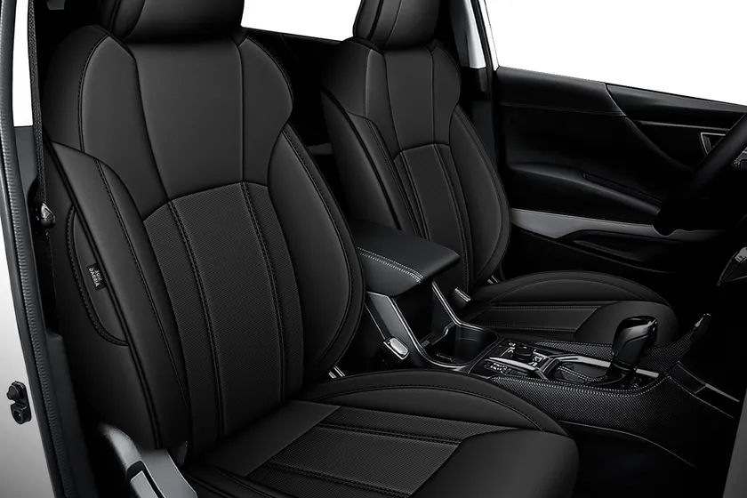 IKABEVEM black faux leather full set seat covers installed throughout a Subaru Crosstrek cabin