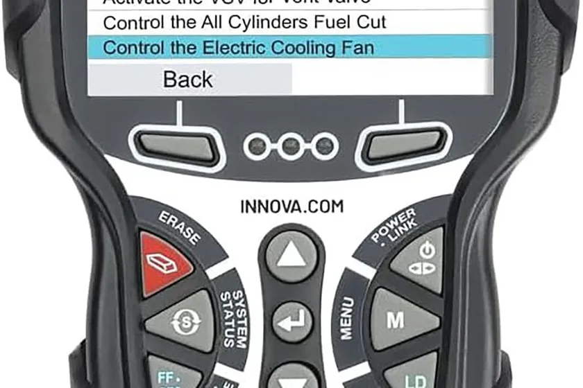Innova 5610 bidirectional scan tool with its handheld display unit and OBD2 cable