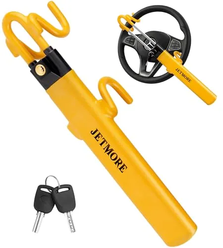 Yellow JETMORE steering wheel lock with a full rubber coating and two keys on a plain background