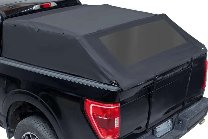 JOYTUTUS black foldable soft camper shell topper on a Ford F-150 short bed