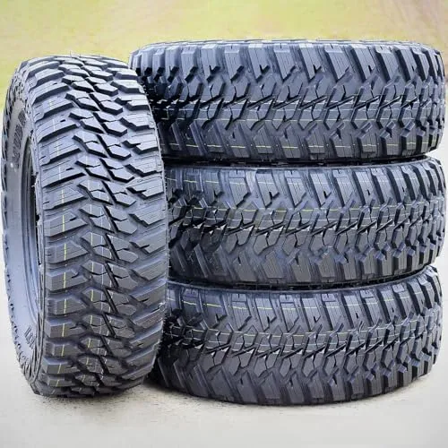 Kanati Mud Hog M/T mud terrain tire with a black sidewall and chunky tread blocks, mounted on a 20 inch light truck fitment