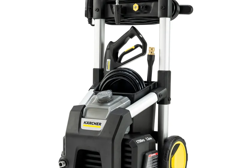Karcher K1700B black and silver electric pressure washer on wheels with telescoping handle, spray gun, coiled hose and onboard soap tank
