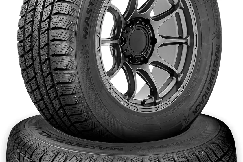 Mastertrack M-TRAC 4S touring tire showing its asymmetric tread with four wide drainage grooves