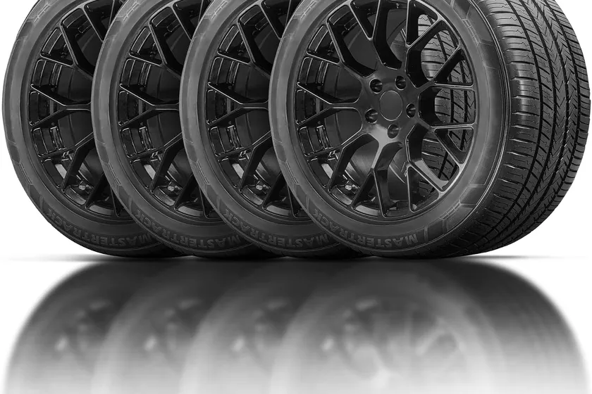 Mastertrack M-TRAC HP all-season tire showing its asymmetric tread pattern on a 19 inch black sidewall casing